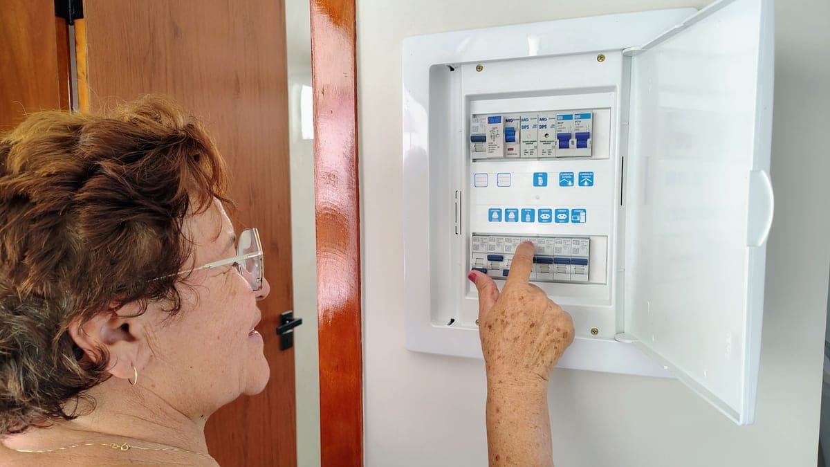 An electrical breaker panel with the door open