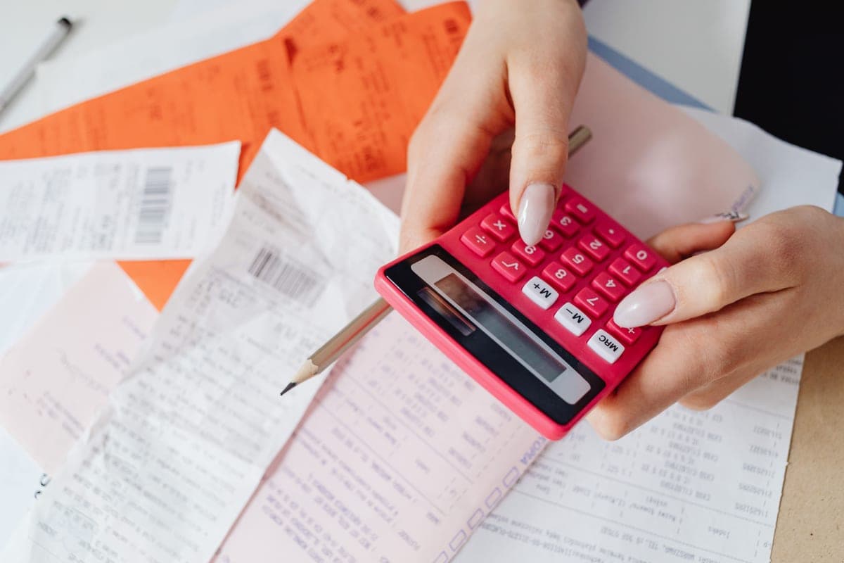 An electricity bill and a calculator on a table
