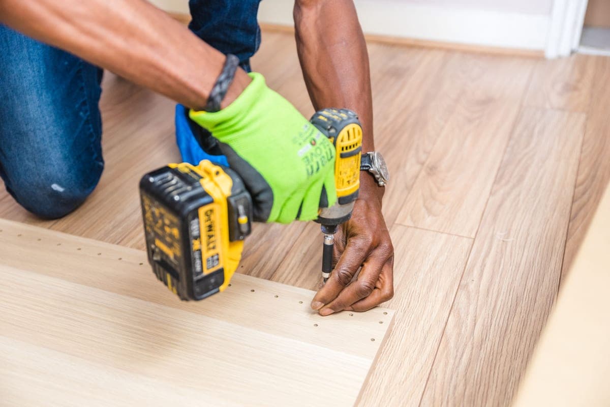 Hands using tools during a home improvement project