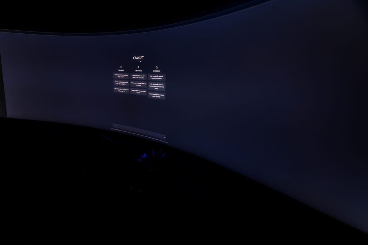 A glowing display panel in a dark room
